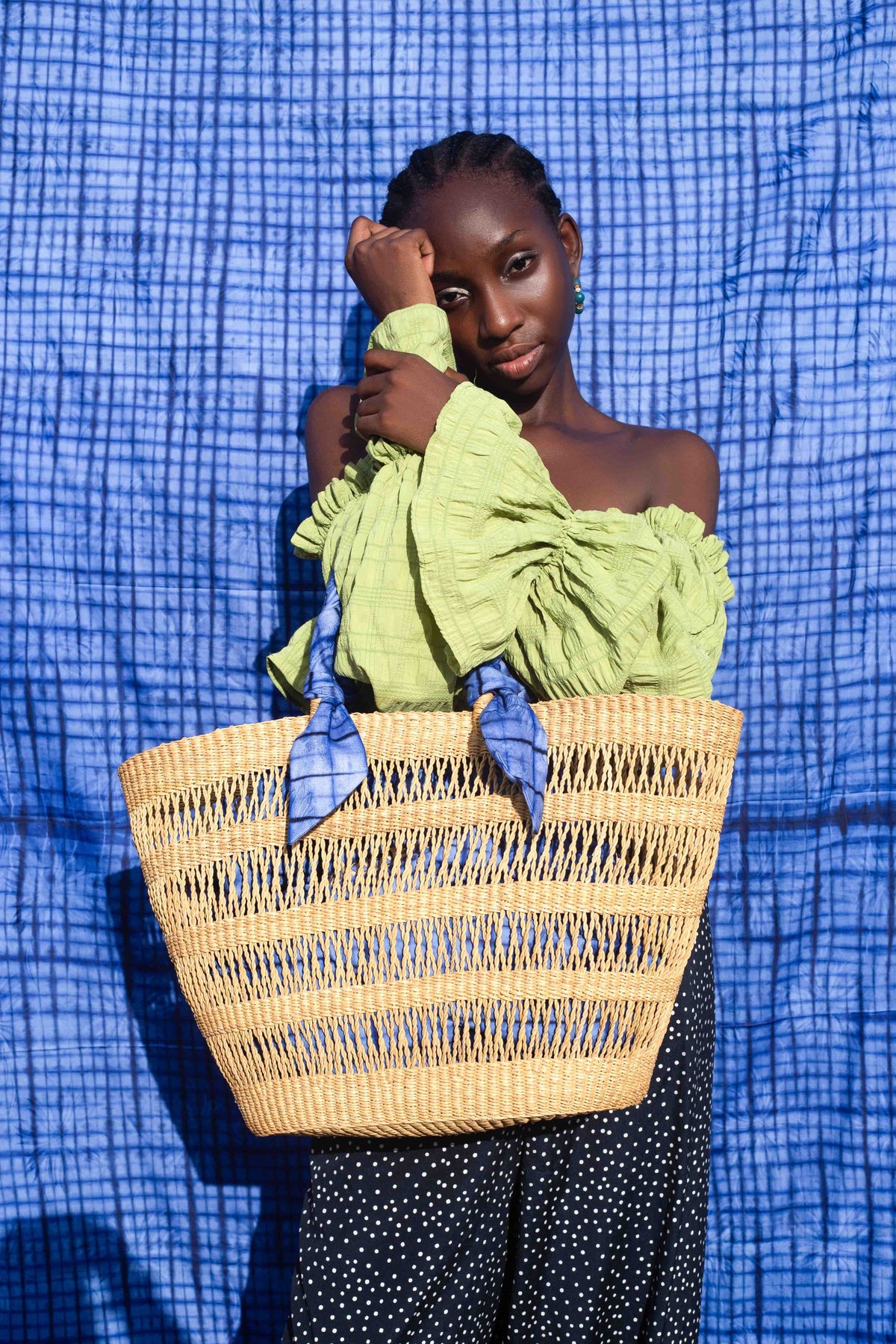 Handwoven tote bag, sustainably crafted by artisans in Ghana.