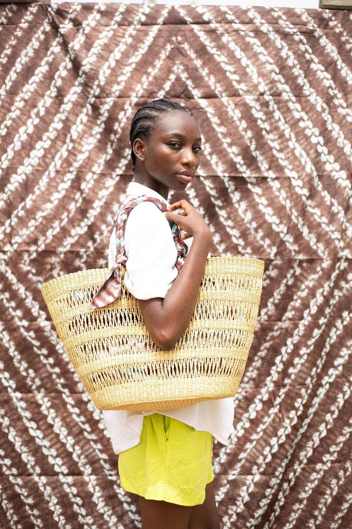 Handwoven tote bag, sustainably crafted by artisans in Ghana.