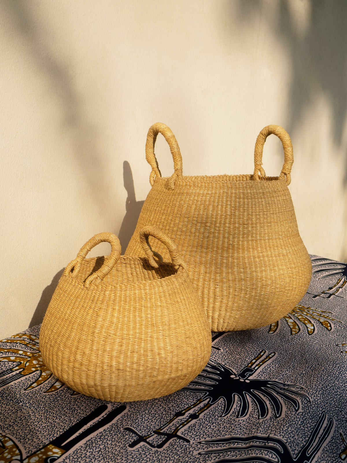 Decorative woven basket in natural, ideal for rustic home decor.