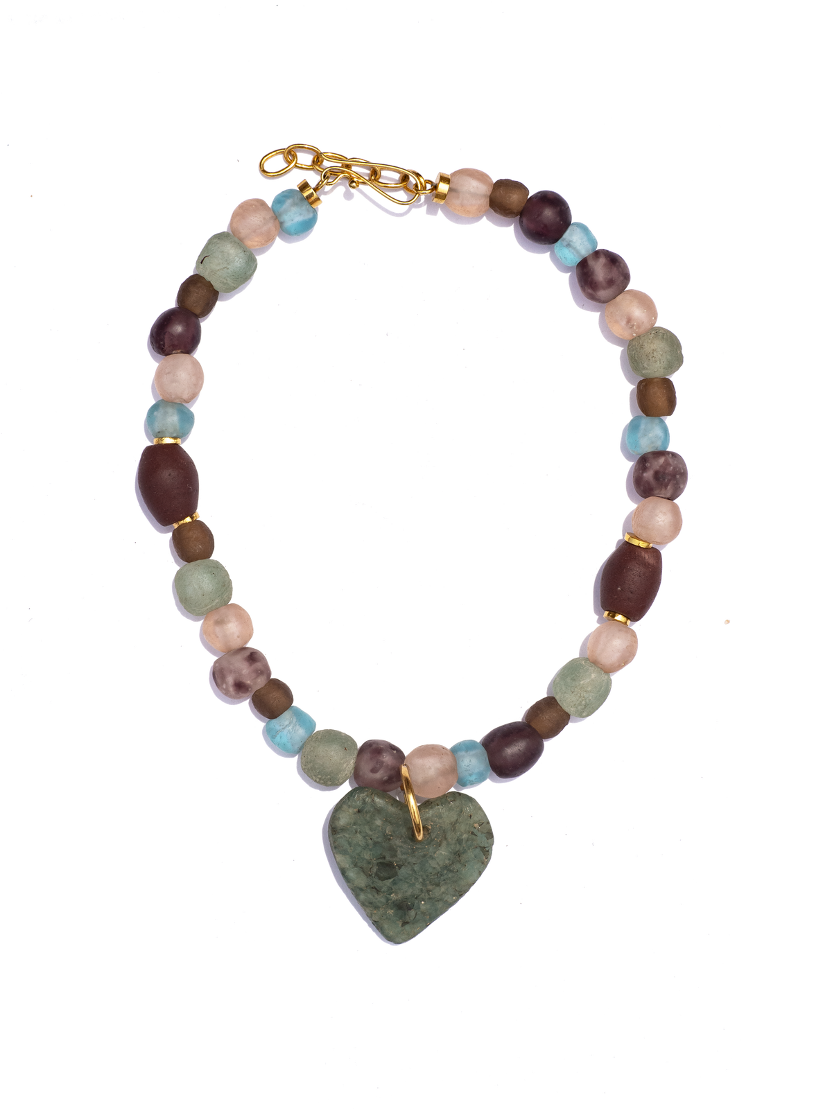 Statement necklace featuring Ghanaian heart-shaped recycled glass beads on a strand of unique red beads, combining vibrant colors and cultural craftsmanship.