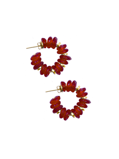 Artisan hoop earrings blending Ghanaian craftsmanship with gold-plated brass and vibrant hand-molded glass beads.