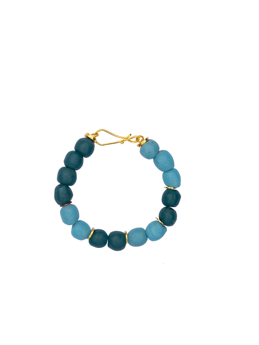 Handcrafted beaded bracelet with ethically sourced recycled glass and gold-plated brass accents.