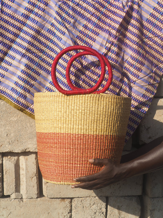 Handwoven storage basket made from natural fibers, perfect for home organization.