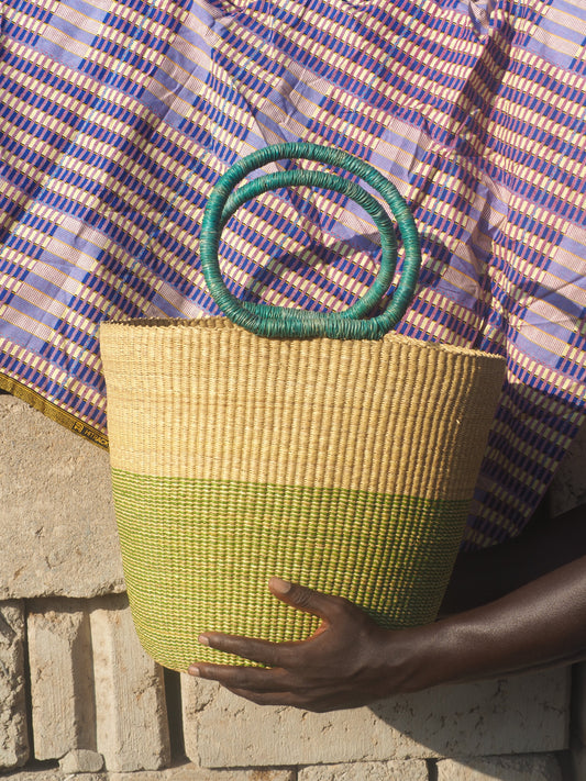 Handwoven storage basket made from natural fibers, perfect for home organization.